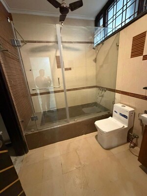 Bathroom in 3 BHK Apartment at Defence Colony – for Rent