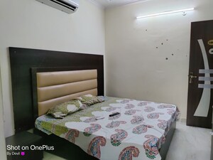 Bedroom in Studio Builder Floor at Ansal Sushant Lok I, Sector 43 – for Rent