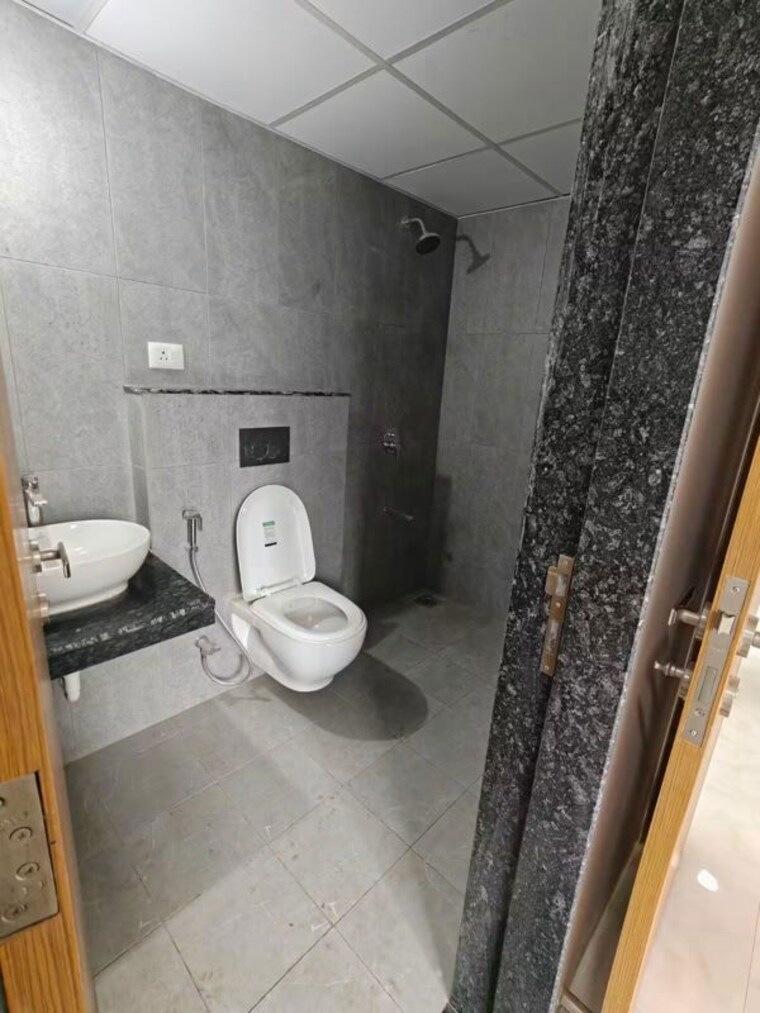 Bathroom, ten-united-athashri 2 Bedroom 1003 Sq.Ft. Apartment In Dhanori Pune 10617666