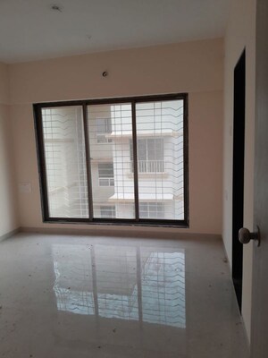 Room in 2 BHK Apartment at Konark J24 Mahavir Nagar CHS, Kandivali West – for Sale