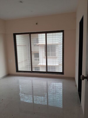 Room in 2 BHK Apartment at Konark J24 Mahavir Nagar CHS, Kandivali West – for Sale