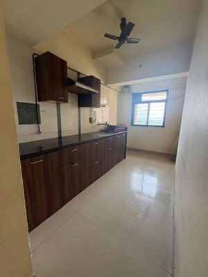 Kitchen in 2 BHK Apartment at Puranik City, Kasarvadavali – for Rent