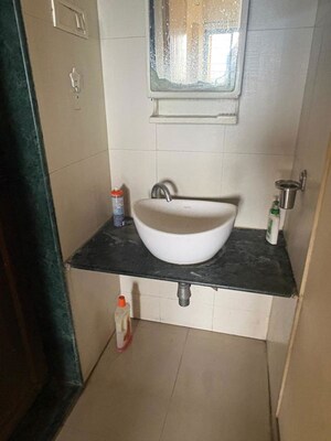 Bathroom in 2 BHK Apartment at Puranik City, Kasarvadavali – for Sale