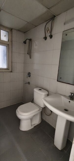 Bathroom in 3 BHK Apartment at Dhoot Time Residency, Sector 63 – for Rent