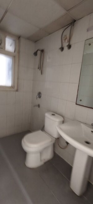 Bathroom in 3 BHK Apartment at Dhoot Time Residency, Sector 63 – for Rent