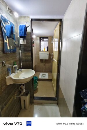 Bathroom in 1 BHK Apartment at Nilkanth Apartment Naupada, Naupada – for Sale