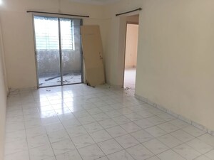 Room in 2 BHK Apartment at Magarpatta City Cosmos, Magarpatta Road – for Rent