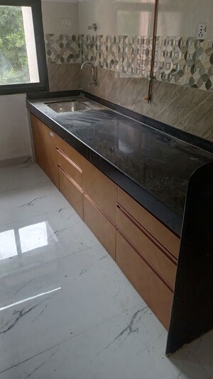 Kitchen in 2 BHK Apartment at Magarpatta Grevillea, Hadapsar – for Rent