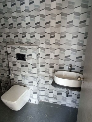 Bathroom in 1 BHK Apartment at Dhamji Shamji Mahavir Spring Tulip Phase 1, Pokhran Road No Two – for Rent
