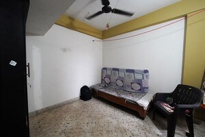 Living Room in 2 BHK Apartment at Maninagar – for Sale