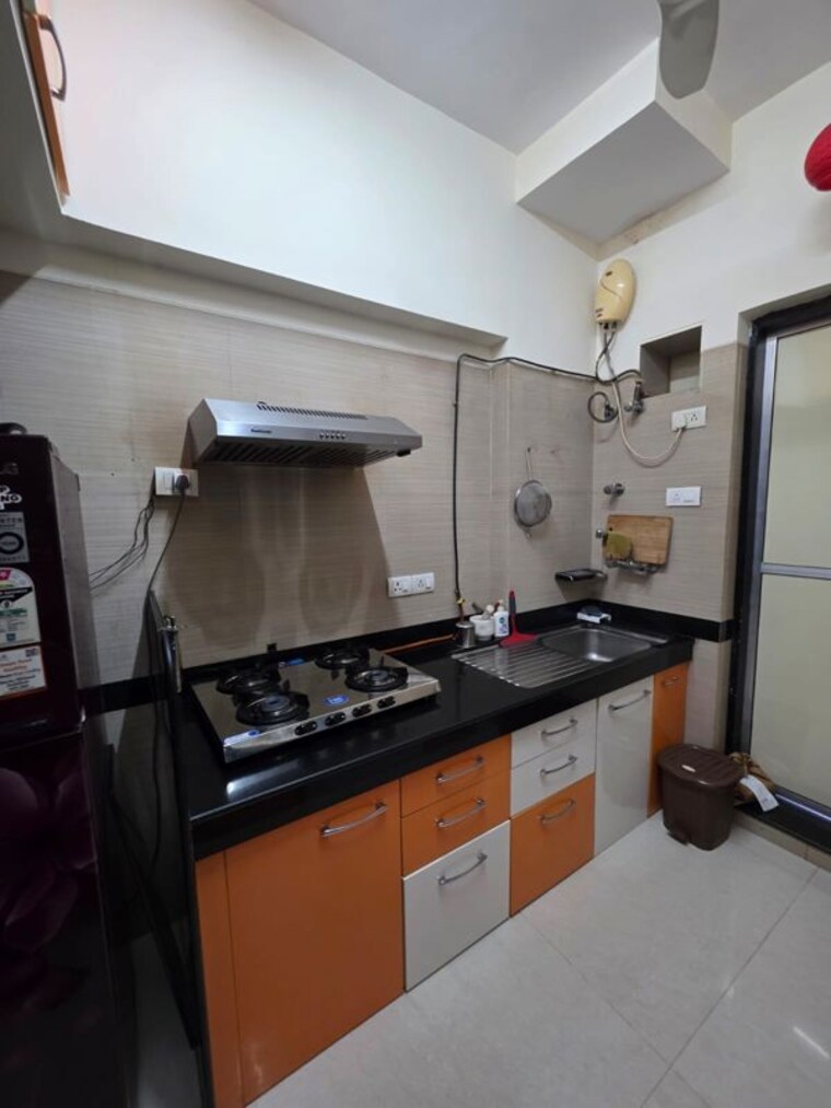 Kitchen, raheja-interface-heights 3 Bedroom 950 Sq.Ft. Apartment In Malad West Mumbai 10617813