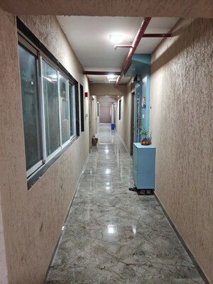 Building Lobby in 1 BHK Apartment at Anant Metropolis Insignia Towers, Kasarvadavali – for Rent