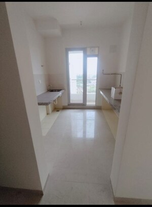 Kitchen in 2 BHK Apartment at Piramal Vaikunth Vijit, Balkum Pada – for Sale
