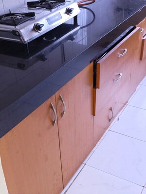 Kitchen in 2 BHK Apartment at Happy Valley, Manpada – for Rent