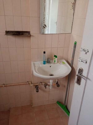 Bathroom in 3 BHK Apartment at Magarpatta City Roystonea, Hadapsar – for Rent