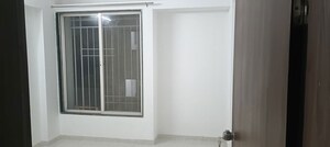 Room in 2 BHK Apartment at Laxmi Emerald, Lohgaon – for Rent