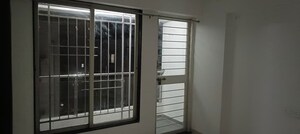 Room in 2 BHK Apartment at Laxmi Emerald, Lohgaon – for Rent