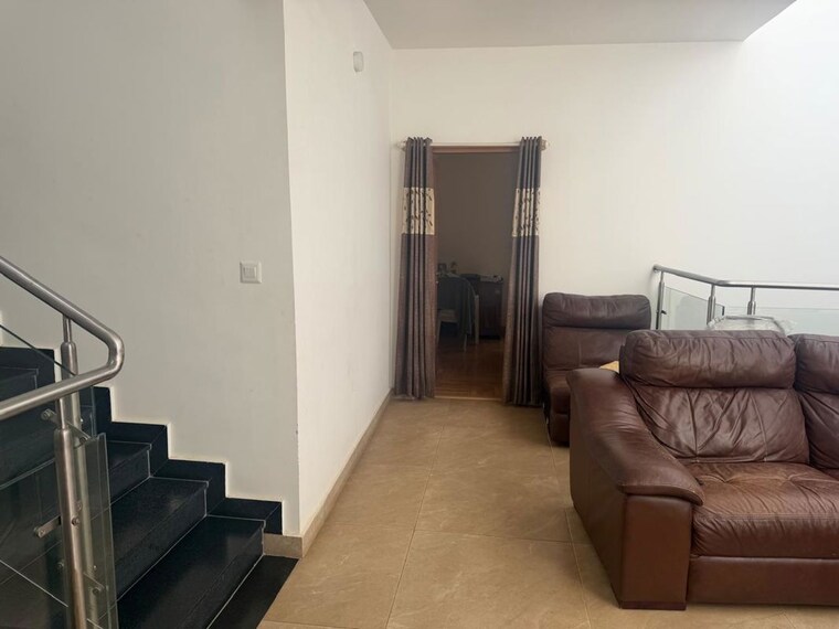 Living Room, assetz-soul-and-soil 3 Bedroom 2182 Sq.Ft. Villa In Chikkagubbi Village Bangalore 10617936