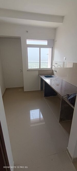 Kitchen in 1 BHK Apartment at Puranik City Reserva, Ghodbunder Road – for Rent