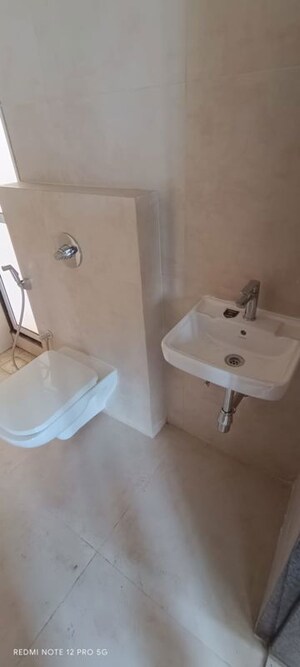 Bathroom in 1 BHK Apartment at Puranik City Reserva, Ghodbunder Road – for Rent