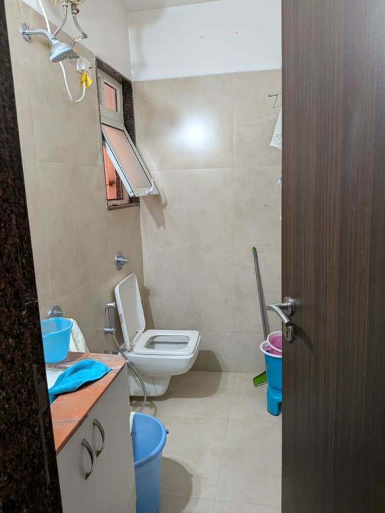 Bathroom, puranik-rumah-bali 1 Bedroom 425 Sq.Ft. Apartment In Ghodbunder Road Thane 10618053