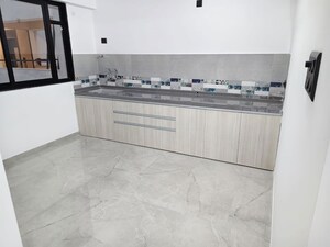 Kitchen in 2 BHK Apartment at Unique Youtopia, Kharadi – for Rent