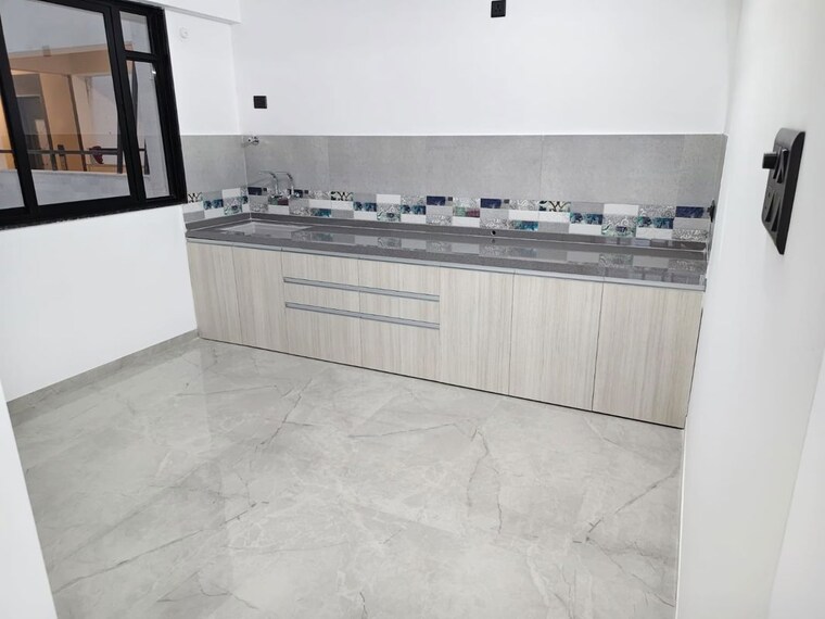 Kitchen, unique-youtopia 2 Bedroom 776 Sq.Ft. Apartment In Kharadi Pune 10618078