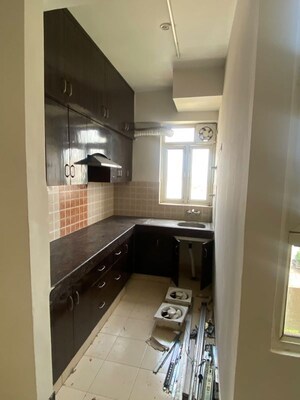 Kitchen in 2 BHK Apartment at Shree Vardhman Mantra, Sector 67 – for Rent