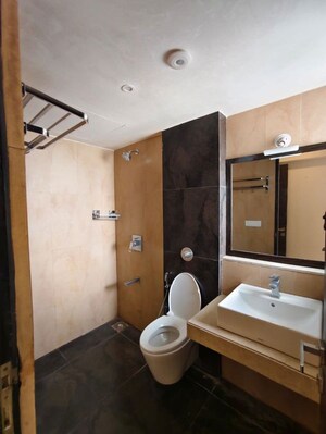 Bathroom in 3 BHK Apartment at Puranik Rumah Bali, Ghodbunder Road – for Rent