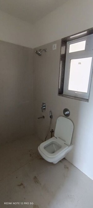 Bathroom in 1 BHK Apartment at Puranik City Reserva, Ghodbunder Road – for Rent