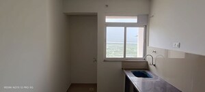 Kitchen in 1 BHK Apartment at Puranik City Reserva, Ghodbunder Road – for Rent