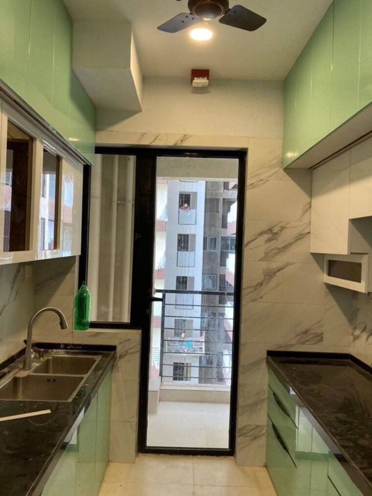 Kitchen, risland-the-icon 2 Bedroom 620 Sq.Ft. Apartment In Dhokali Thane 10618080