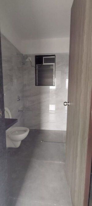 Bathroom in 2 BHK Apartment at Anant Metropolis Insignia Towers, Kasarvadavali – for Rent