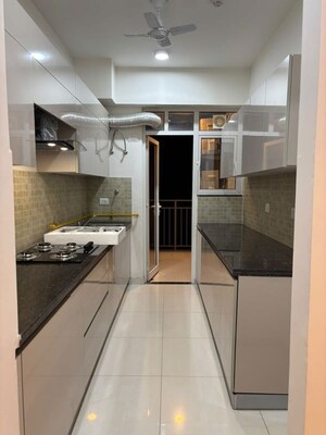 Kitchen in 2 BHK Apartment at Godrej Woods, Sector 43 – for Rent