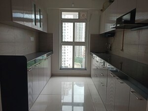 Kitchen in 3 BHK Apartment at Godrej Emerald, Ghodbunder Road – for Rent
