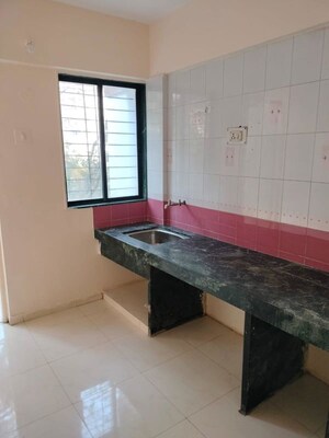 Kitchen in 2 BHK Apartment at Futuristic Millefiori, Wakad – for Rent