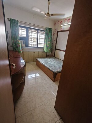 Living Room in 2 BHK Apartment at Spring Leaf 6 CHS, Kandivali East – for Rent