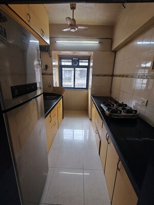 Kitchen in 2 BHK Apartment at Spring Leaf 6 CHS, Kandivali East – for Rent