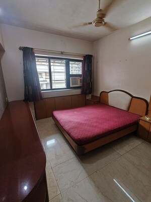 Bedroom in 2 BHK Apartment at Spring Leaf 6 CHS, Kandivali East – for Rent