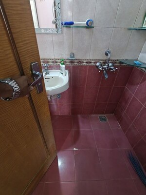 Bathroom in 2 BHK Apartment at Spring Leaf 6 CHS, Kandivali East – for Rent