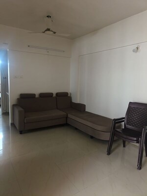 Living Room in 2 BHK Apartment at Essen Shonest Towers, Wakad – for Rent