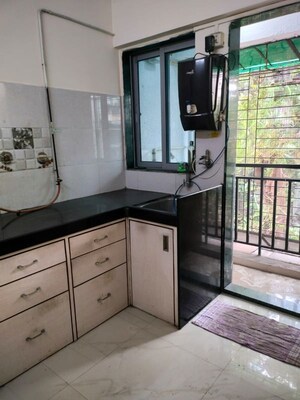 Kitchen in 2 BHK Apartment at Sita Vihar CHS, Naupada – for Sale