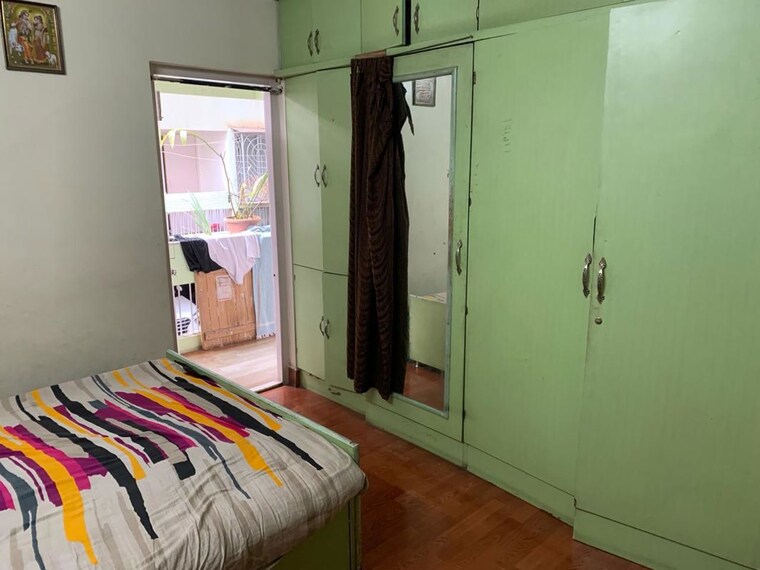 Bedroom, magarpatta-city-cosmos 3 Bedroom 1200 Sq.Ft. Apartment In Magarpatta Road Pune 10618351