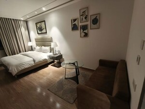 Living Room in Studio Apartment at AIPL Joy Street, Sector 66 – for Rent