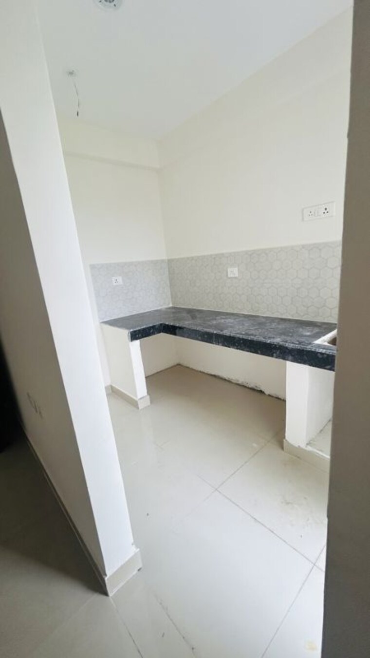 Kitchen, sikka-kannan-greens 2 Bedroom 835 Sq.Ft. Apartment In Sikri Kalan Ghaziabad 10618440