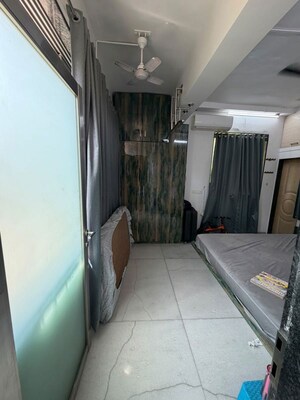 Living Room in 2 BHK Apartment at Mahim West – for Rent