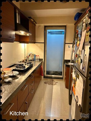 Kitchen in 2 BHK Apartment at Group Seven Rushi Heights, Goregaon East – for Rent