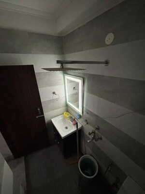 Bathroom in 1 BHK Apartment at Sainik Farm – for Rent