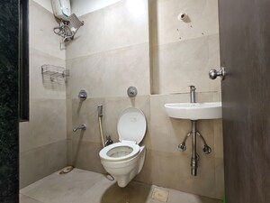 Bathroom in 1 BHK Apartment at Conwood Astoria, Goregaon East – for Rent