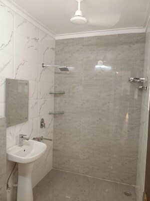 Bathroom in 4 BHK Builder Floor at Green Fields Colony – for Rent